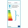 Industrijska podna lampa Steinhauer Mexlite Nové u mat crnoj boji sa zlatnom unutrašnjošću abažura pored radnog stola