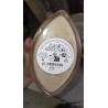 WoodWick Vanilla Bean ovalna mirisna sveća u staklenoj posudi sa drvenim poklopcem i blago pomerenim voskom